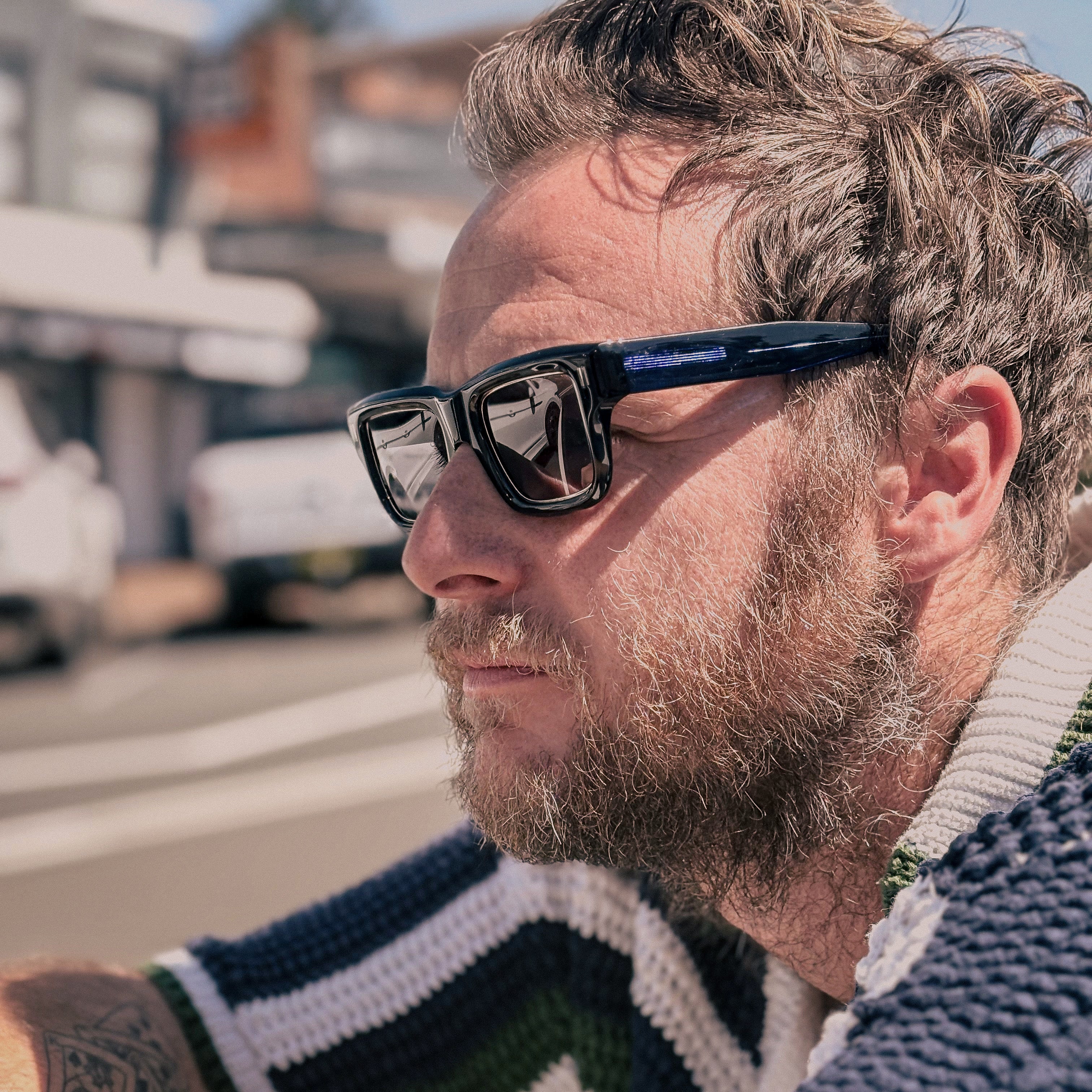 Man wearing Inkwell blue Jessie Boys sunglasses