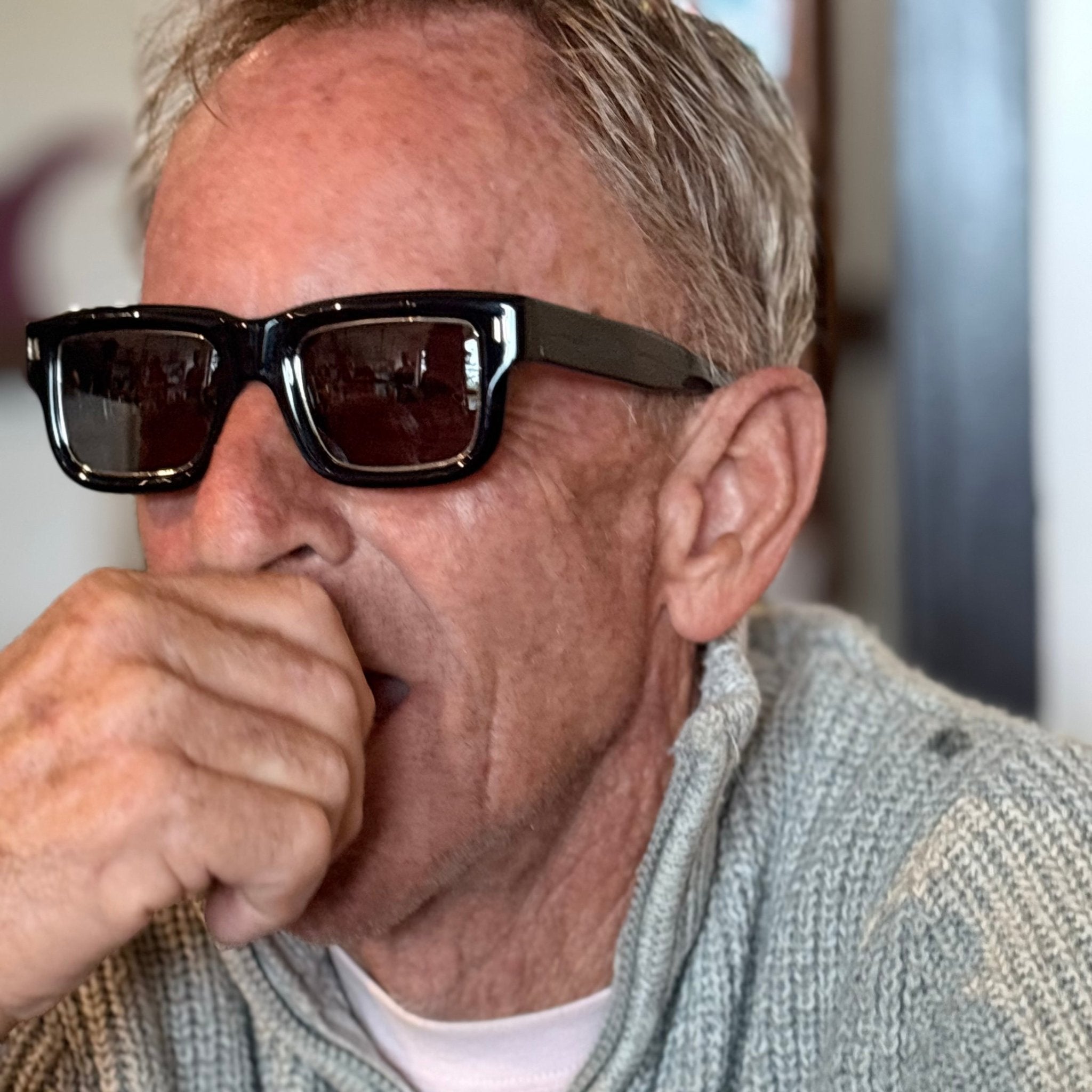 Man wearing Jessie Boys Finchley Cut sunglasses in Inkwell Blue