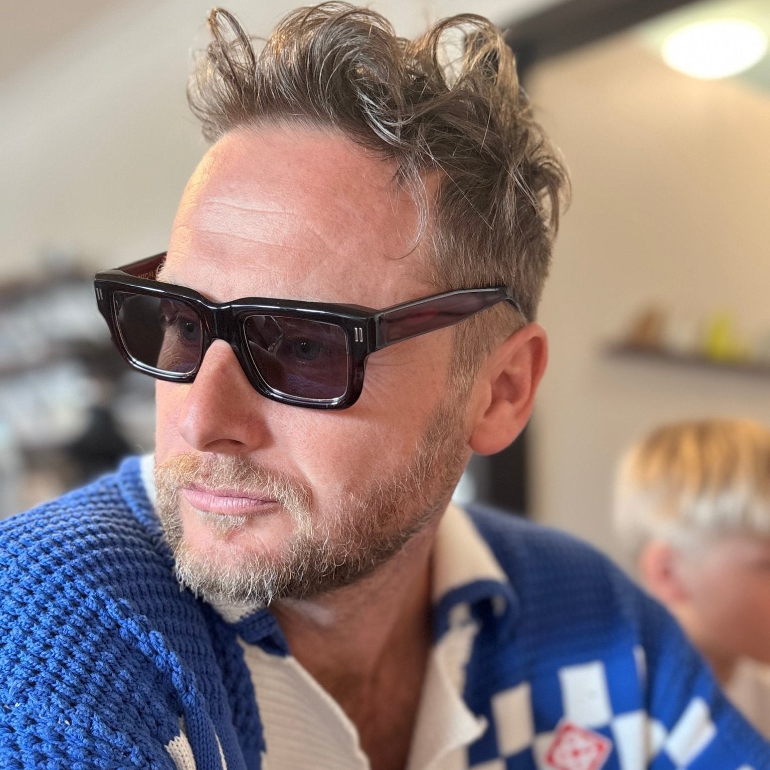 Man wearing Jessie Boys Finchley Cut sunglasses in Oxford Burgundy